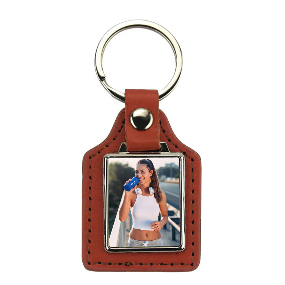 Breloc piele cu pandantiv metalic